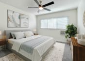 Thumbnail 5 of 52 - a bedroom with a bed and a ceiling fan