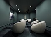 Thumbnail 7 of 25 - Theater room with comfortable seating and large screen