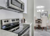 Thumbnail 37 of 102 - Kitchen With Electric Stove