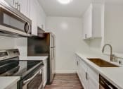 Thumbnail 38 of 102 - Kitchen With Full Stainless Steel Appliances