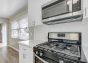 Thumbnail 44 of 83 - Kitchen With Gas Range
