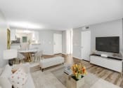 Thumbnail 3 of 39 - a living room with a couch and a tv