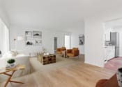 Thumbnail 3 of 17 - a living room with white walls and wooden floors