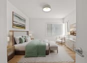 Thumbnail 4 of 17 - a bedroom with a bed and a desk and a window