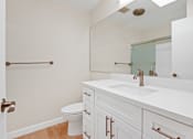 Thumbnail 18 of 18 - a bathroom with a sink and a toilet