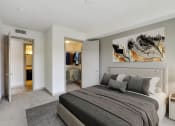 Thumbnail 3 of 45 - a bedroom with a bed and a closet