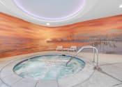 Thumbnail 93 of 95 - A hot tub in a room with a sunset mural on the wall.
