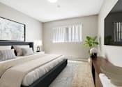 Thumbnail 9 of 15 - A bedroom with a large bed and a painting on the wall.
