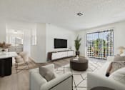 Thumbnail 3 of 115 - A living room with a white couch and a television.