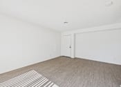 Thumbnail 30 of 115 - A room with a striped rug on the floor.