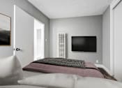 Thumbnail 15 of 19 - A bedroom with a bed, chair, and a television.