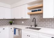 Thumbnail 19 of 50 - Open Shelves Above Kitchen Sink