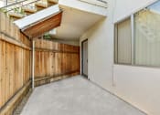 Thumbnail 13 of 14 - Patio of apartment, wood fence