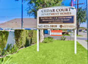 Thumbnail 2 of 14 - Cedar Court Apartment Homes signage, Bachelors, 1 and 2 bedrooms, private patios, cable/DSL Ready, air conditioning, 562-925-5919