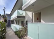Thumbnail 3 of 12 - a view of the side of a building with glass walls