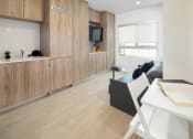 Thumbnail 7 of 12 - a kitchen and living room in a small apartment