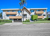 Thumbnail 22 of 22 - A multi-story building with the number 521 on it.