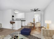 Thumbnail 18 of 95 - an open living room and kitchen with a table and chairs
