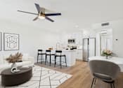 Thumbnail 20 of 65 - A modern living room with a dining area and kitchen in the background.