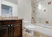 Thumbnail 80 of 88 - a bathroom with a toilet and a bathtub