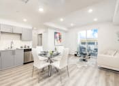 Thumbnail 2 of 42 - Dining area with wood inspired flooring, recessed lighting, Open kitchen, living room on the right