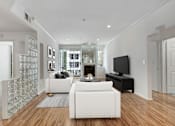 Thumbnail 17 of 28 - a living room with two white couches and a tv