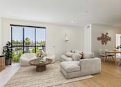 Thumbnail 6 of 157 - A living room with a large window and a view of the city.