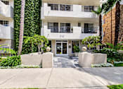Thumbnail 14 of 16 - The image shows the front of a building with the number 310 on it.