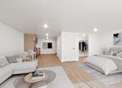 Thumbnail 36 of 54 - A modern bedroom with a large bed and a living area.