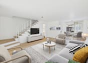 Thumbnail 1 of 50 - A living room with a grey couch and a coffee table.