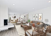 Thumbnail 74 of 135 - a living room with white walls and hardwood floors