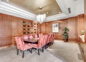 Thumbnail 28 of 95 - a dining room with a table and chairs and a chandelier