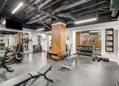 Thumbnail 36 of 95 - the gym is equipped with cardio equipment and weights
