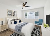 Thumbnail 15 of 228 - A bedroom with a bed, chair, and ceiling fan.