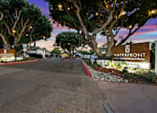 Thumbnail 188 of 208 - Waterfront Residences & Marina sign at dusk.
