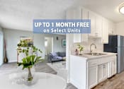 Thumbnail 1 of 64 - A kitchen with a white countertop and a fridge.