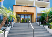 Thumbnail 4 of 24 - the facade of a building with a staircase in front of it