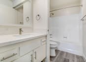 Thumbnail 24 of 24 - a bathroom with a sink and a toilet