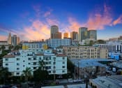 Thumbnail 36 of 39 - a view of the city at sunset