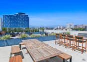 Thumbnail 26 of 39 - Rooftop Deck with Picnic area, BBQ Grills, 360° Views