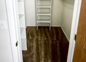 Thumbnail 17 of 21 - Walk-in Closet in the 1 bedroom apartment at Ashley Pointe apartments