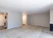 Thumbnail 60 of 63 - Spacious Living Room with a Fireplace in the Two Bedroom One Bath Apartment at Woodbridge Apartments Bloomington