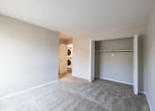 Thumbnail 54 of 63 - Spacious Primary Bedroom in the Two Bedroom Two Bath Apartment at Woodbridge Apartments Bloomington