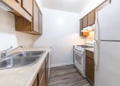 Thumbnail 1 of 12 - Fully-Equipped Kitchen in a 2 bedroom apartment at Woodlake Apartments