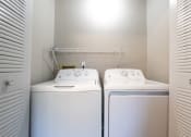 Thumbnail 41 of 63 - Laundry Area in the Three Bedroom Townhome at Woodbridge Apartments Bloomington