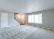 Thumbnail 40 of 63 - Spacious Living Room in the Three Bedroom Townhome at Woodbridge Apartments Bloomington
