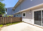 Thumbnail 39 of 63 - Enclosed Patio in the Three Bedroom Townhome at Woodbridge Apartments Bloomington