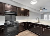 Thumbnail 7 of 19 - ADA-compliant kitchen in a 1-bedroom, 1-bathroom apartment at Briarwood Apartments in Lexington.