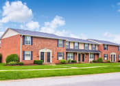 Thumbnail 7 of 14 - Exterior Building at  Addison on Main with beautifully landscaped grounds