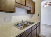 Thumbnail 16 of 25 - Apartment Kitchen at The Woods of Eagle Creek